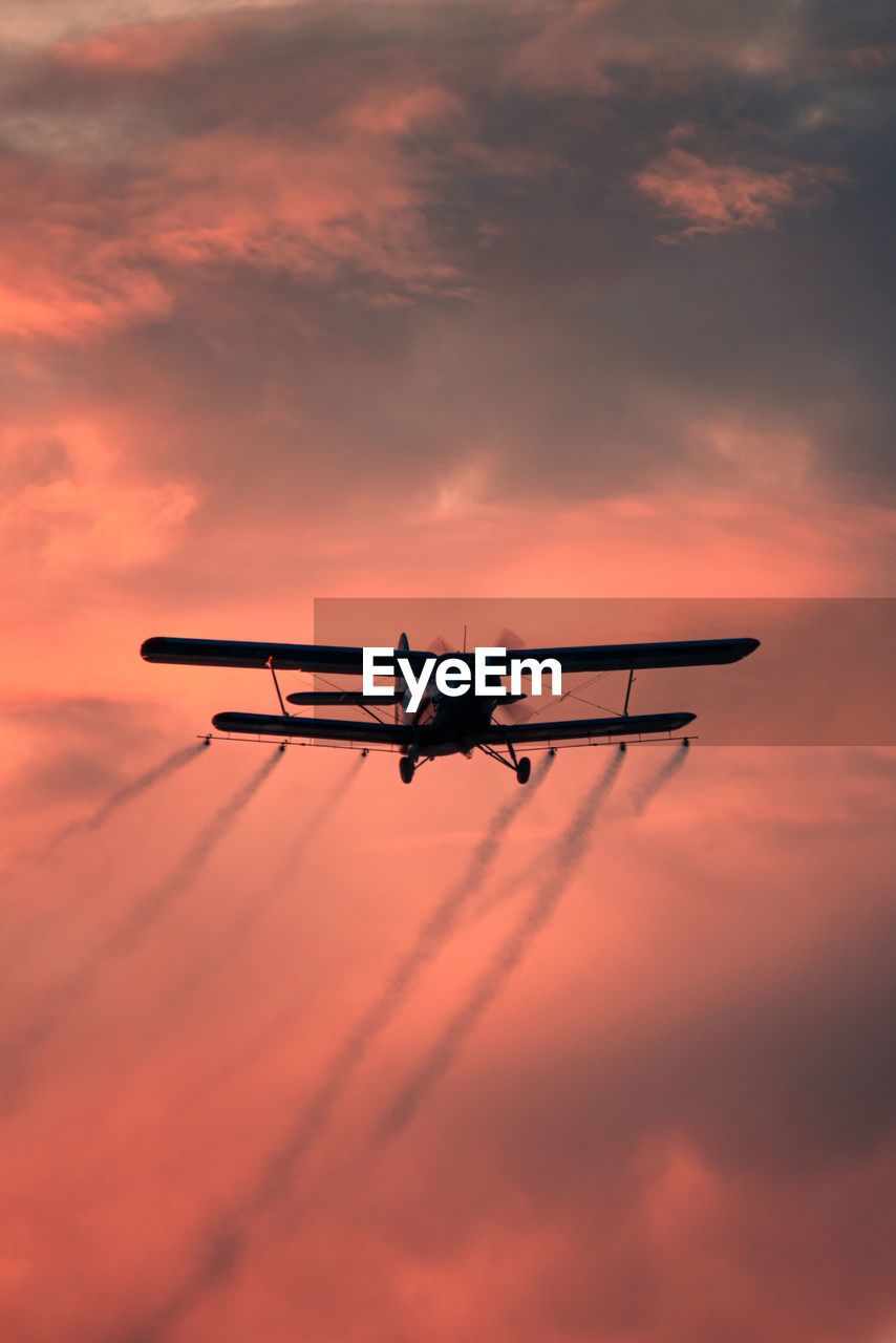 low angle view of airplane against sky