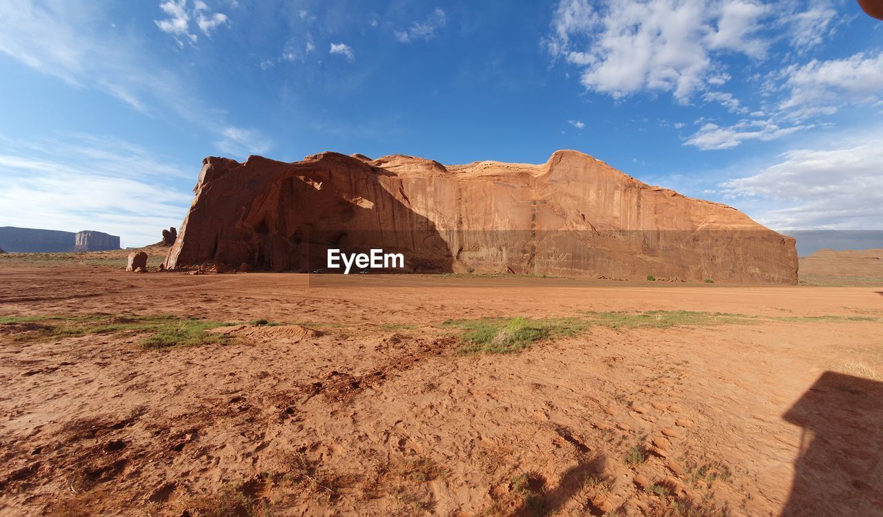 Rock formations in desert against sky, monument valley