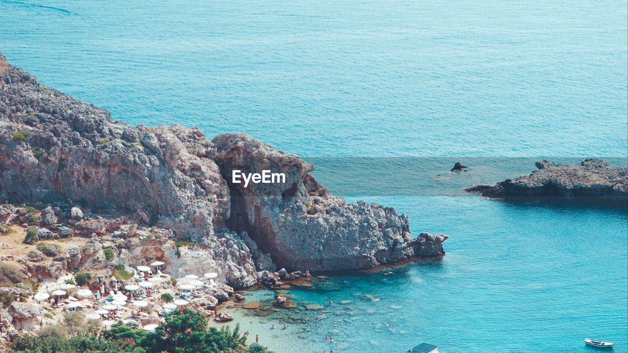 High angle view of rocks on sea