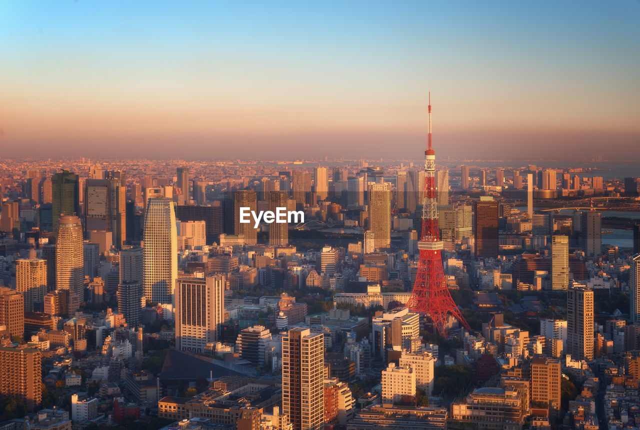 High angle view of city buildings during sunset