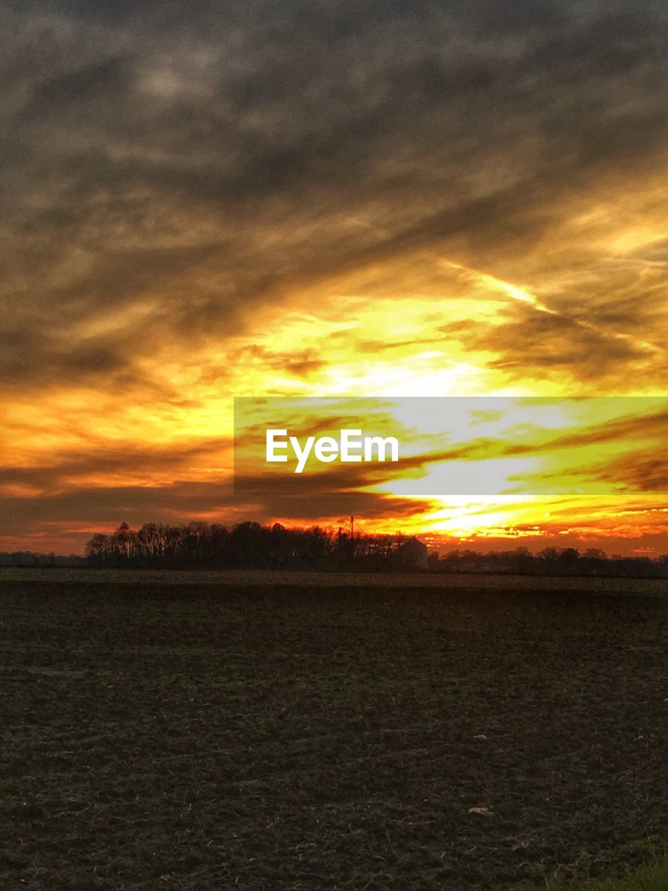 SCENIC VIEW OF LANDSCAPE AGAINST SKY DURING SUNSET