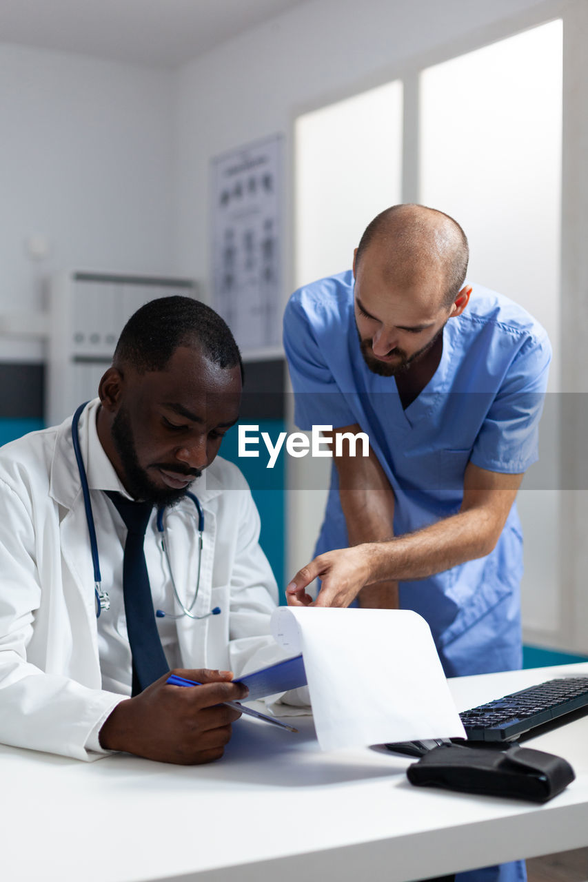 Doctor examining patient at hospital