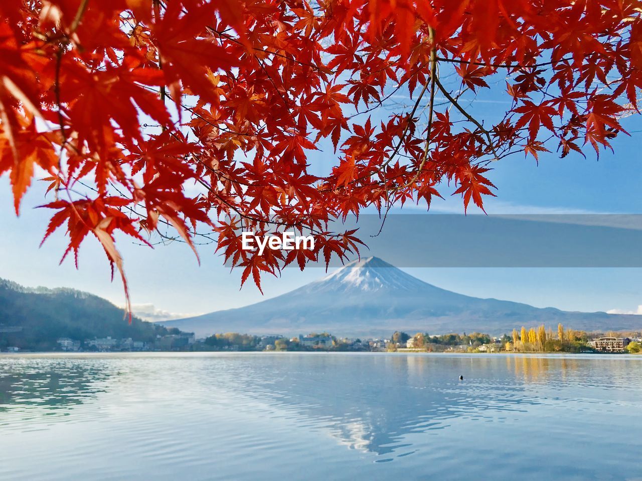 Scenic view of lake against sky during autumn