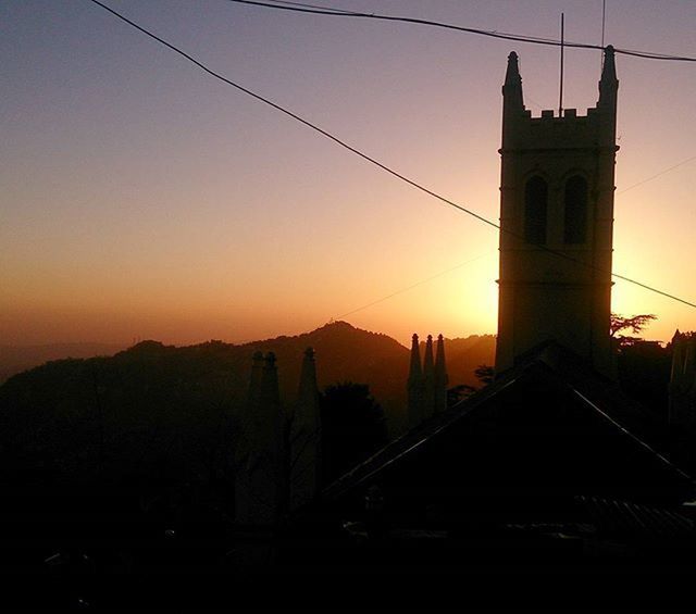 VIEW OF BUILT STRUCTURE AT SUNSET