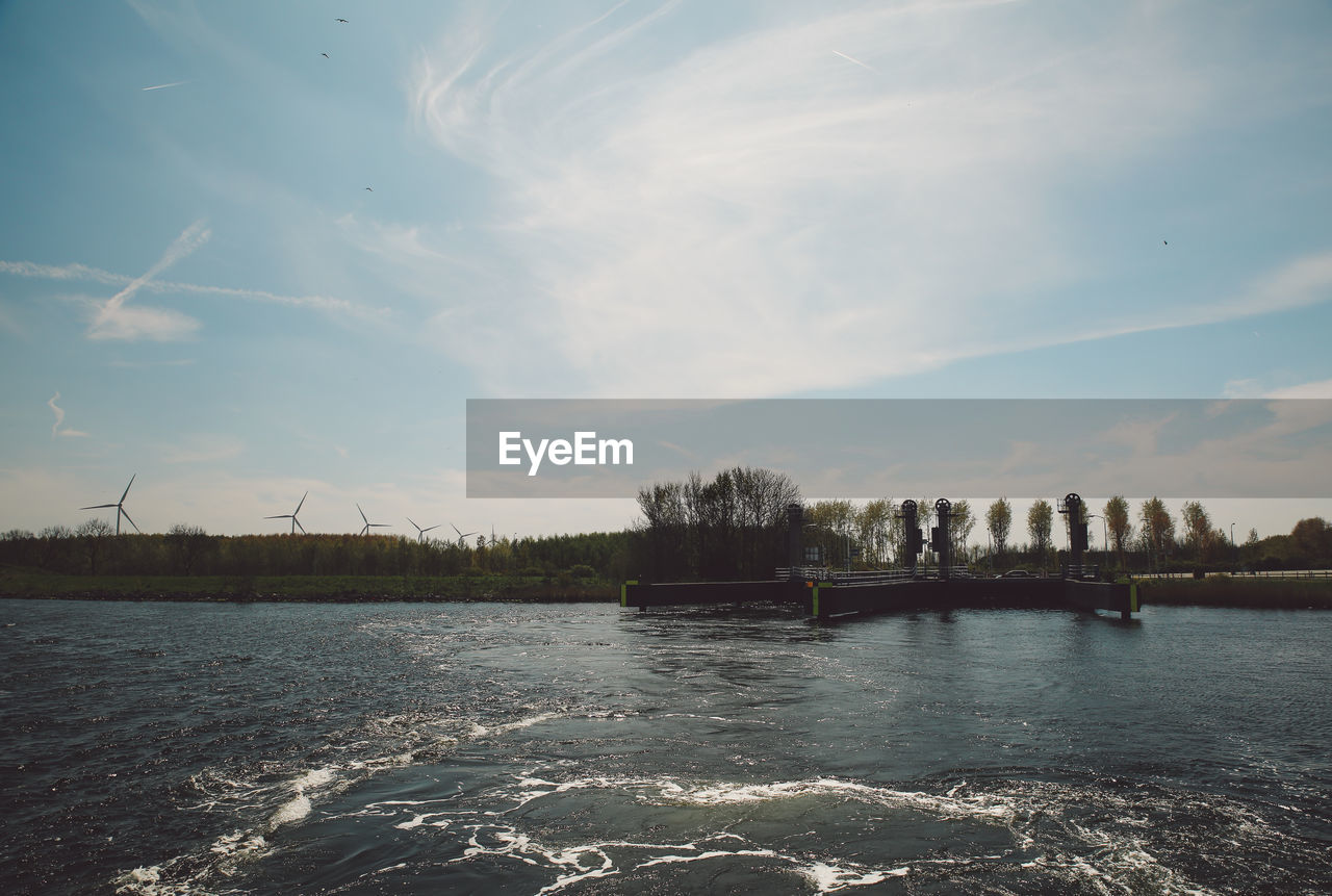 Scenic view of river against sky