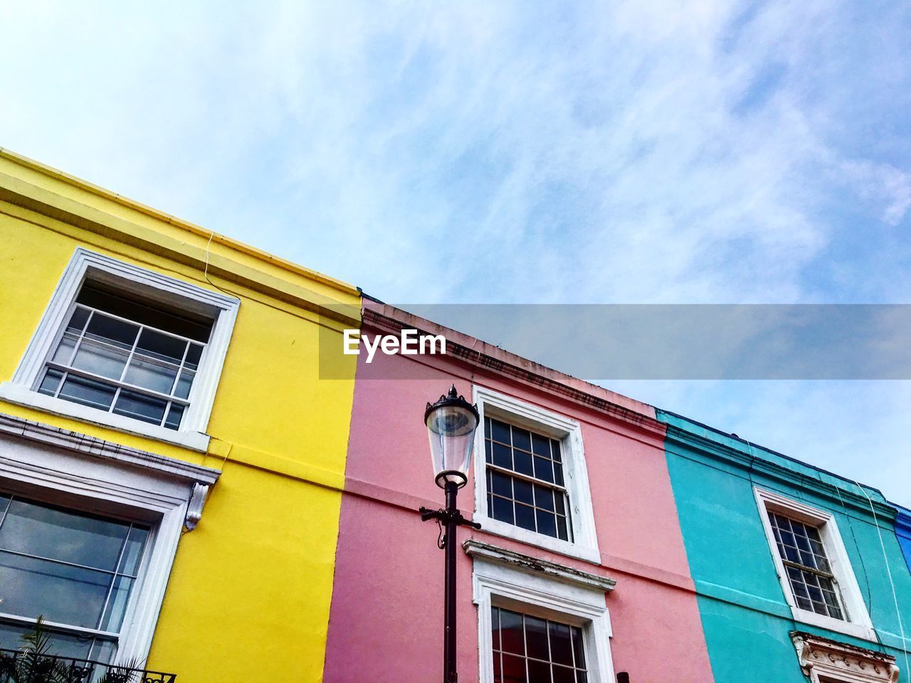 Low angle view of colorful building against sky