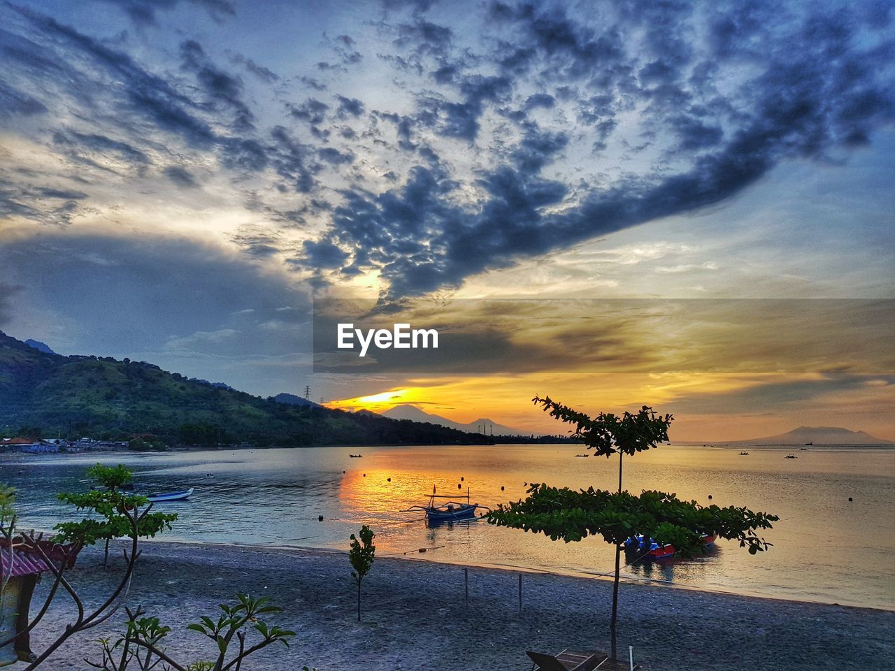 SCENIC VIEW OF SEA DURING SUNSET