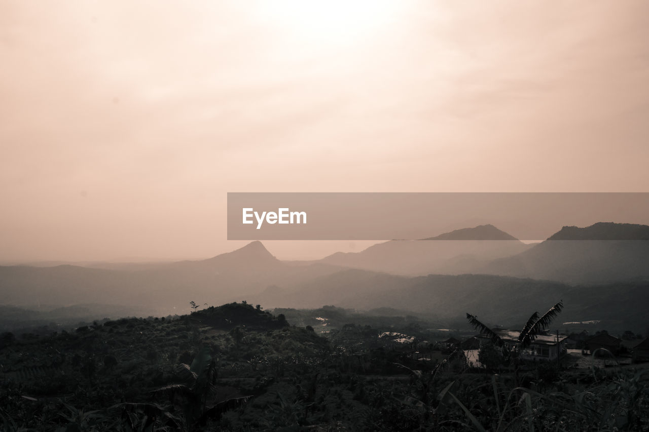 SCENIC VIEW OF MOUNTAINS AGAINST CLEAR SKY