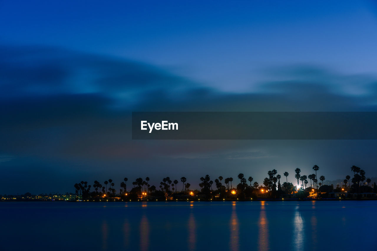 Scenic view of sea against sky at night