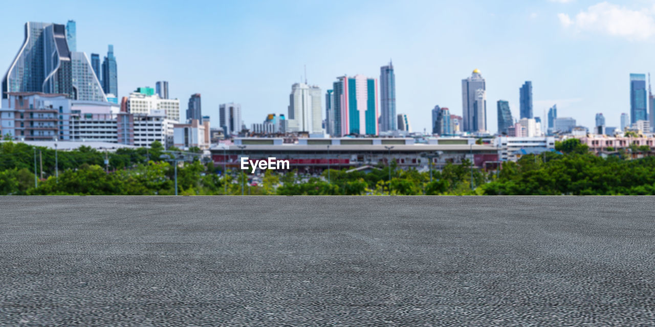 View of modern buildings in city against sky