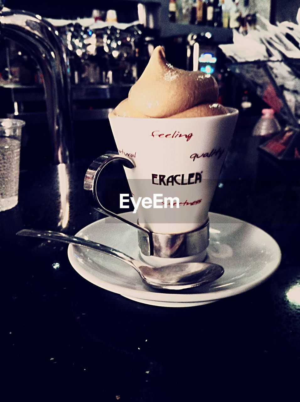 COFFEE CUP ON TABLE