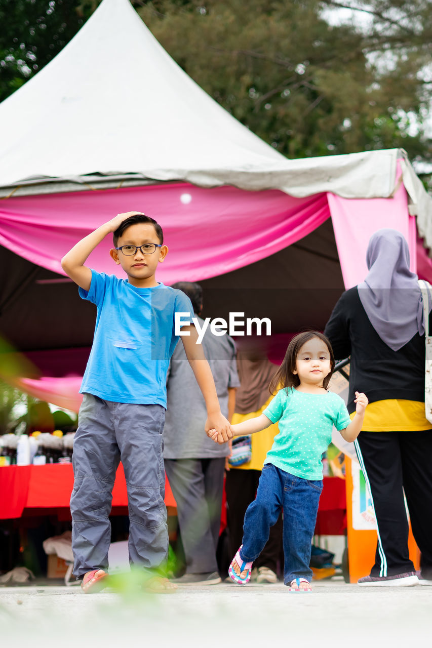 Children standing at the event in malaysia.