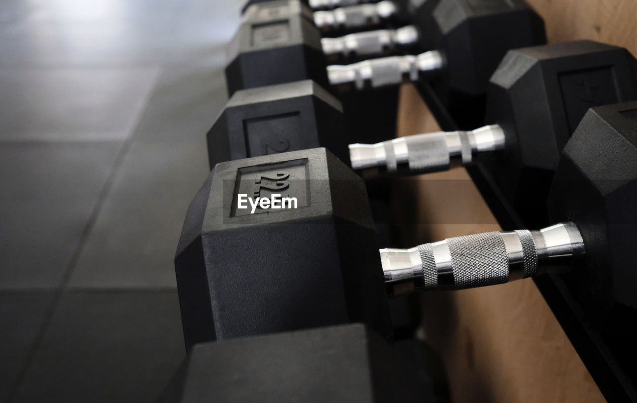 indoors, technology, dumbbell, exercising, sports training, equipment, exercise equipment, weight, gym, close-up, muscular build, sport venue, room, strength, sports