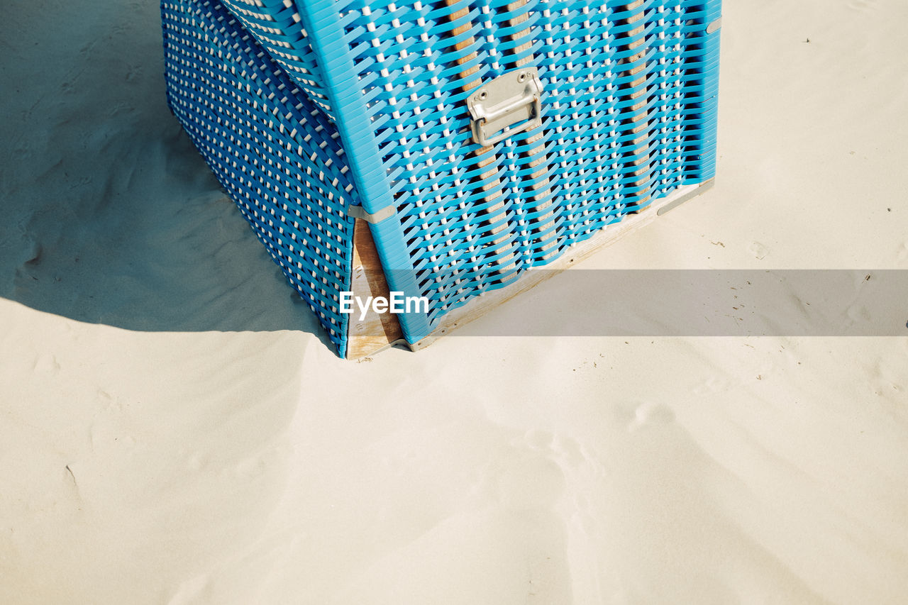 High angle view of empty beach chair