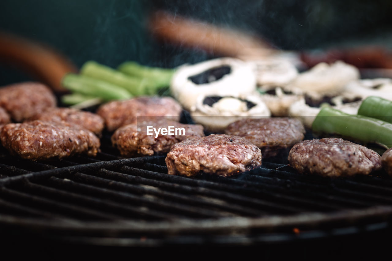 Close-up of meat on barbecue grill