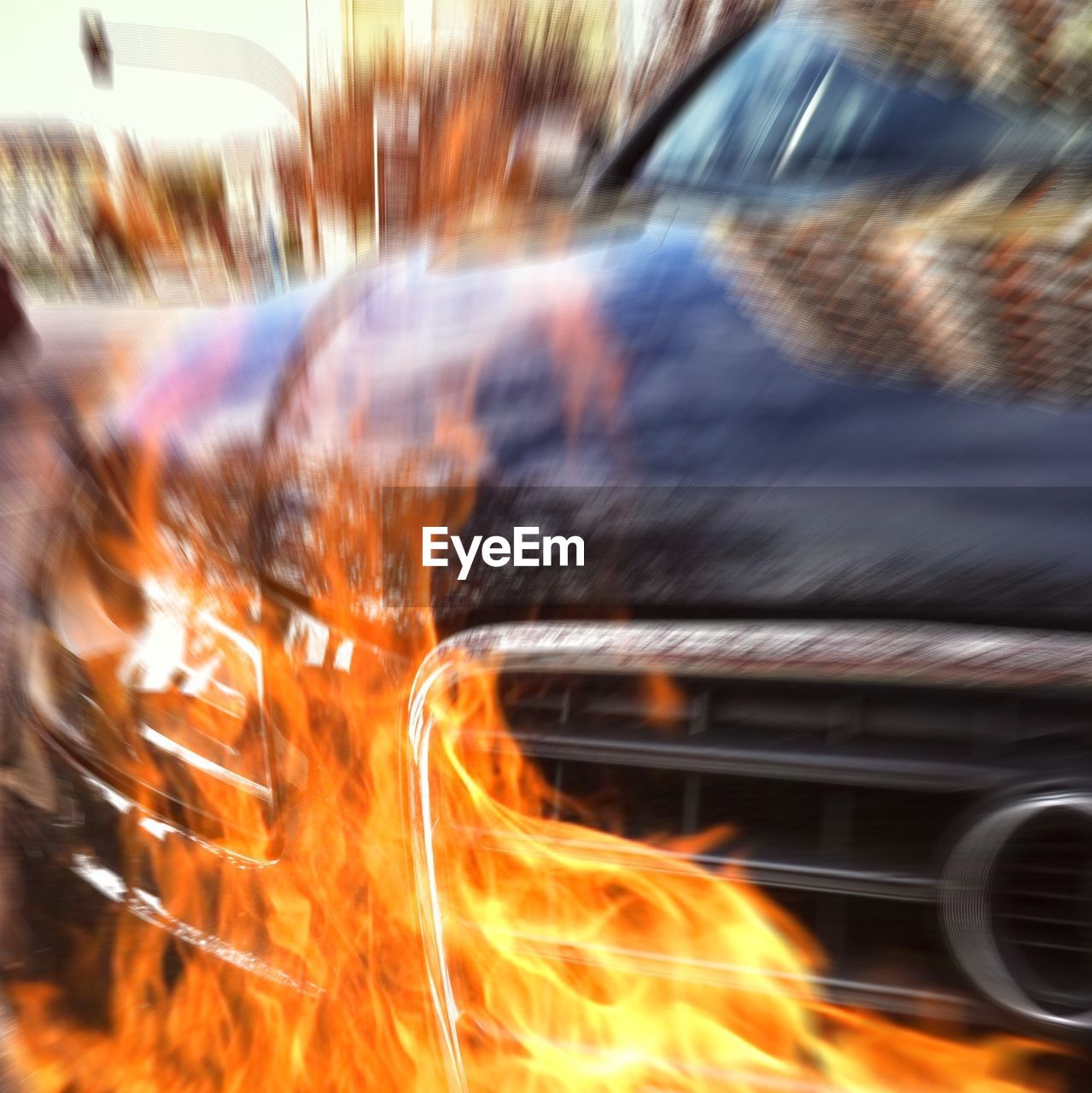 BLURRED MOTION OF CAR ON FIRE