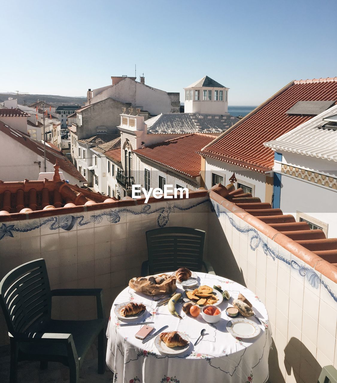 High angle view of food on table at terrace in city