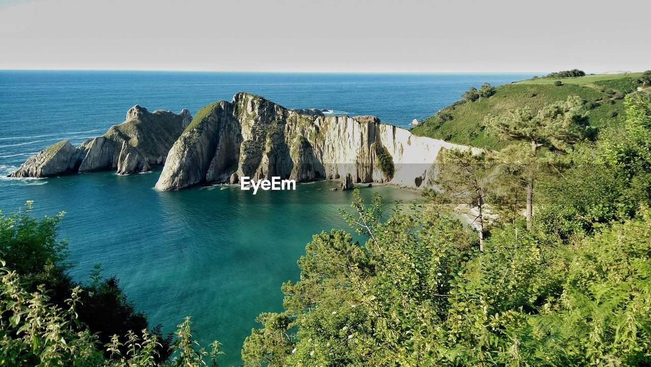 Panoramic view of sea against clear sky