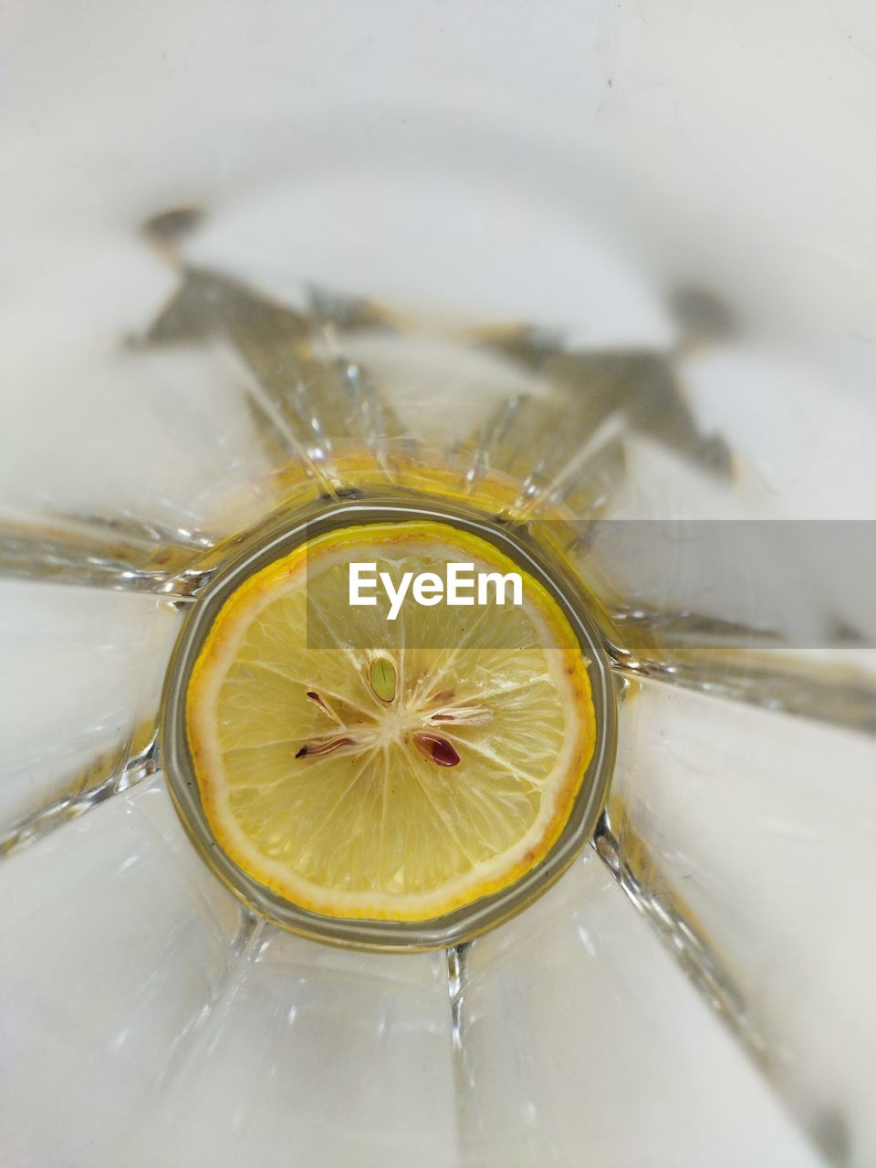 yellow, food and drink, fruit, close-up, citrus fruit, healthy eating, food, lemon, citrus, produce, macro photography, wellbeing, freshness, slice, indoors, refreshment, drink, no people, lime, plant, household equipment, flower, drinking glass, high angle view, water, still life