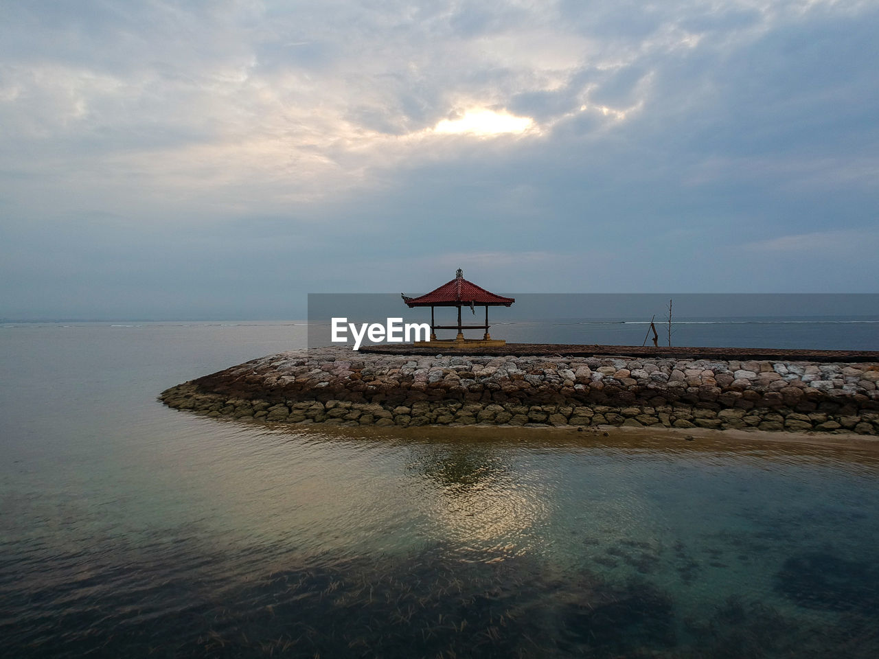 Scenic view of sea against sky during sunrise