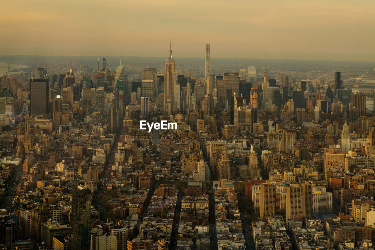 High angle view of downtown district at sunset