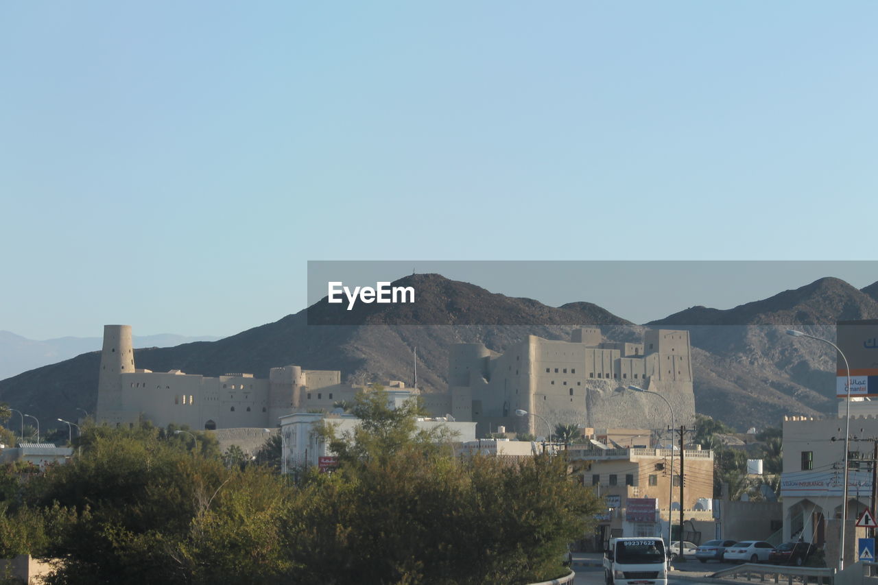 VIEW OF CITYSCAPE AGAINST CLEAR SKY