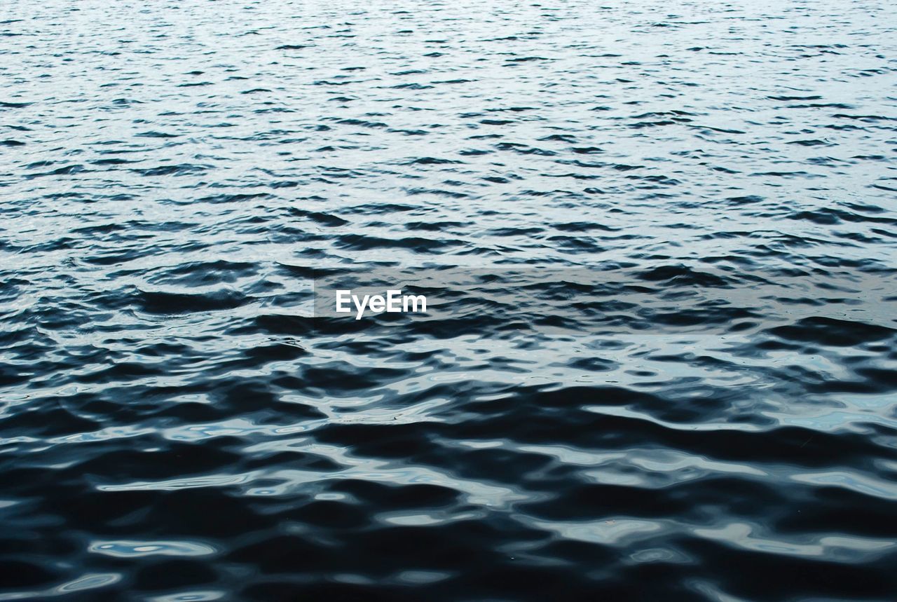 FULL FRAME SHOT OF SWIMMING POOL AT SEA