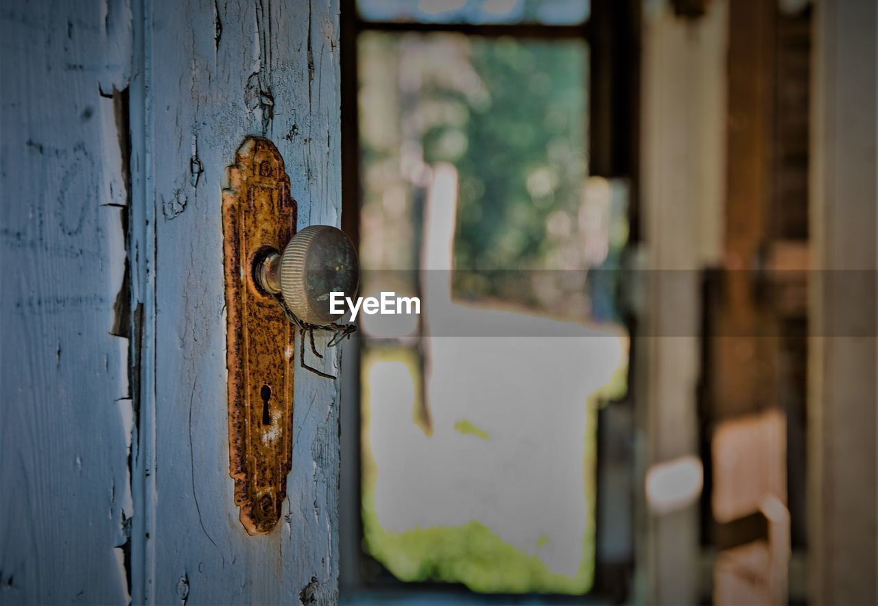 CLOSE-UP OF METAL DOOR