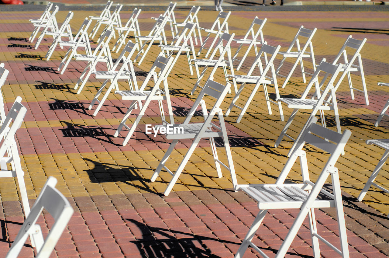 High angle view of empty chairs