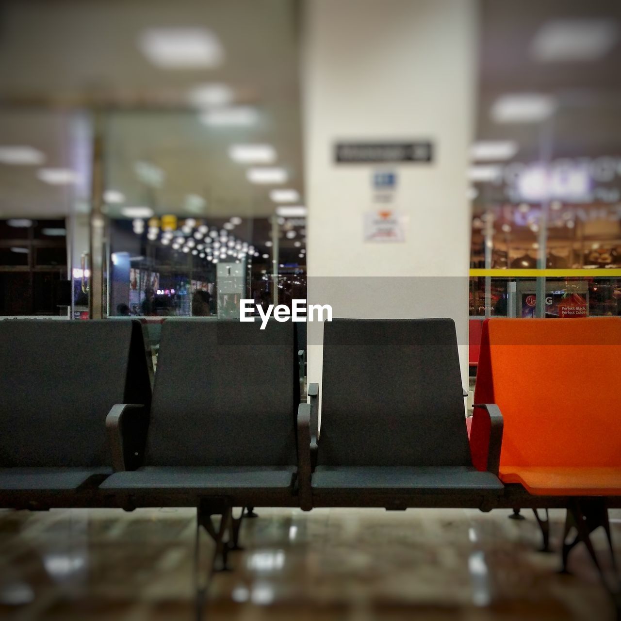 CHAIRS AND TABLES IN AIRPORT