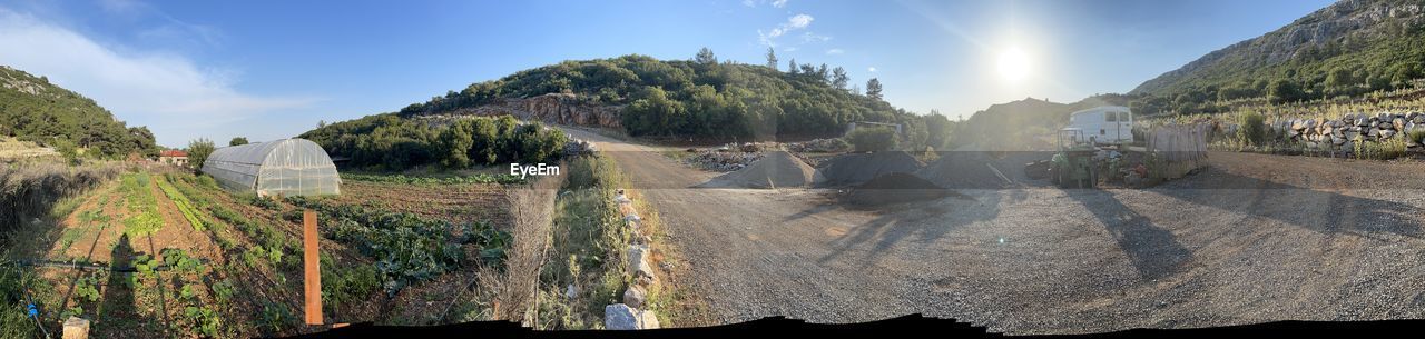 panoramic, sky, landscape, nature, environment, mountain, terrain, land, scenics - nature, plant, sunlight, cloud, mountain range, tree, travel, screenshot, no people, outdoors, beauty in nature, travel destinations, valley, architecture, sun, rural scene, agriculture, blue