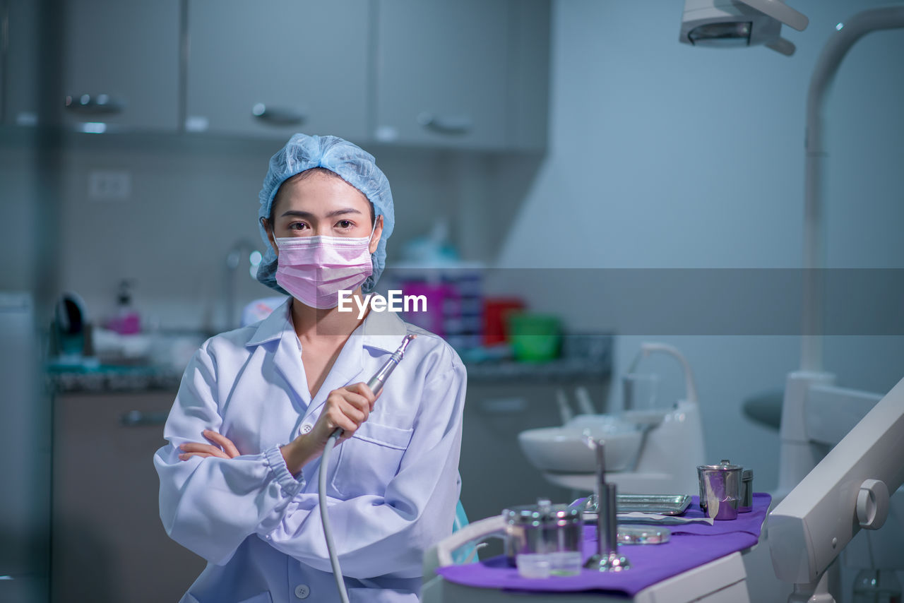 Female dentists with equipment in the dental room