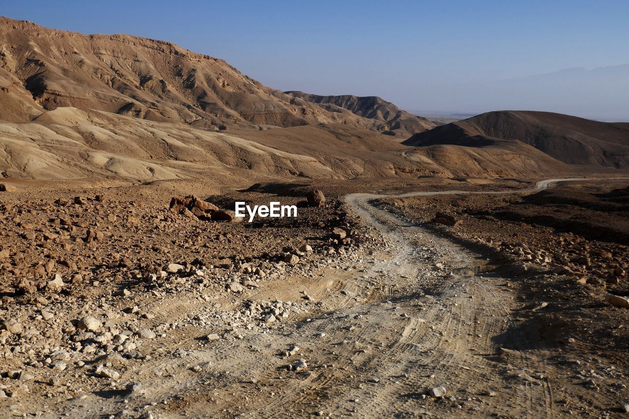 Scenic view of desert against sky