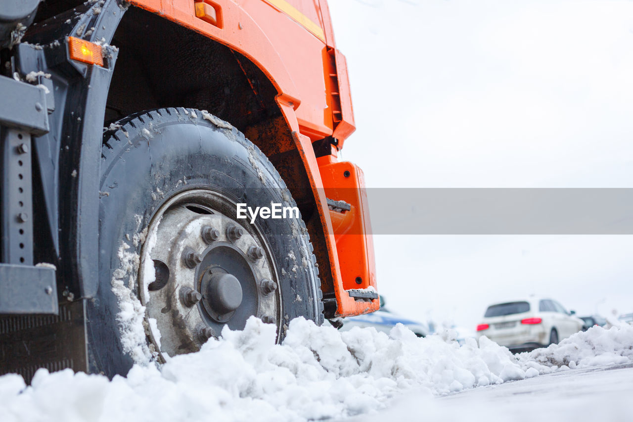 CARS ON SNOW FIELD