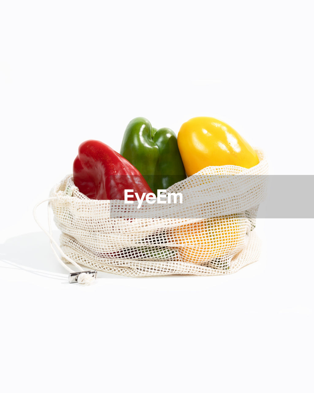 food, food and drink, studio shot, cut out, healthy eating, white background, vegetable, freshness, produce, wellbeing, pepper, fruit, indoors, basket, bell pepper, no people, bell peppers and chili peppers, capsicum, red, container, organic, copy space, yellow, still life, retail, raw food, yellow pepper, plant