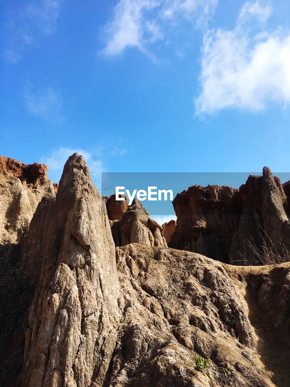 LOW ANGLE VIEW OF ROCK FORMATION