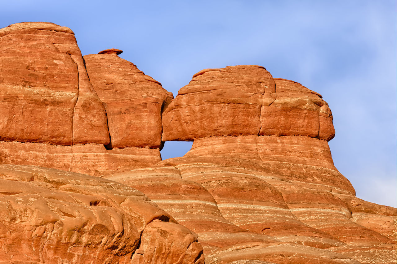 ROCK FORMATIONS AGAINST CLEAR SKY