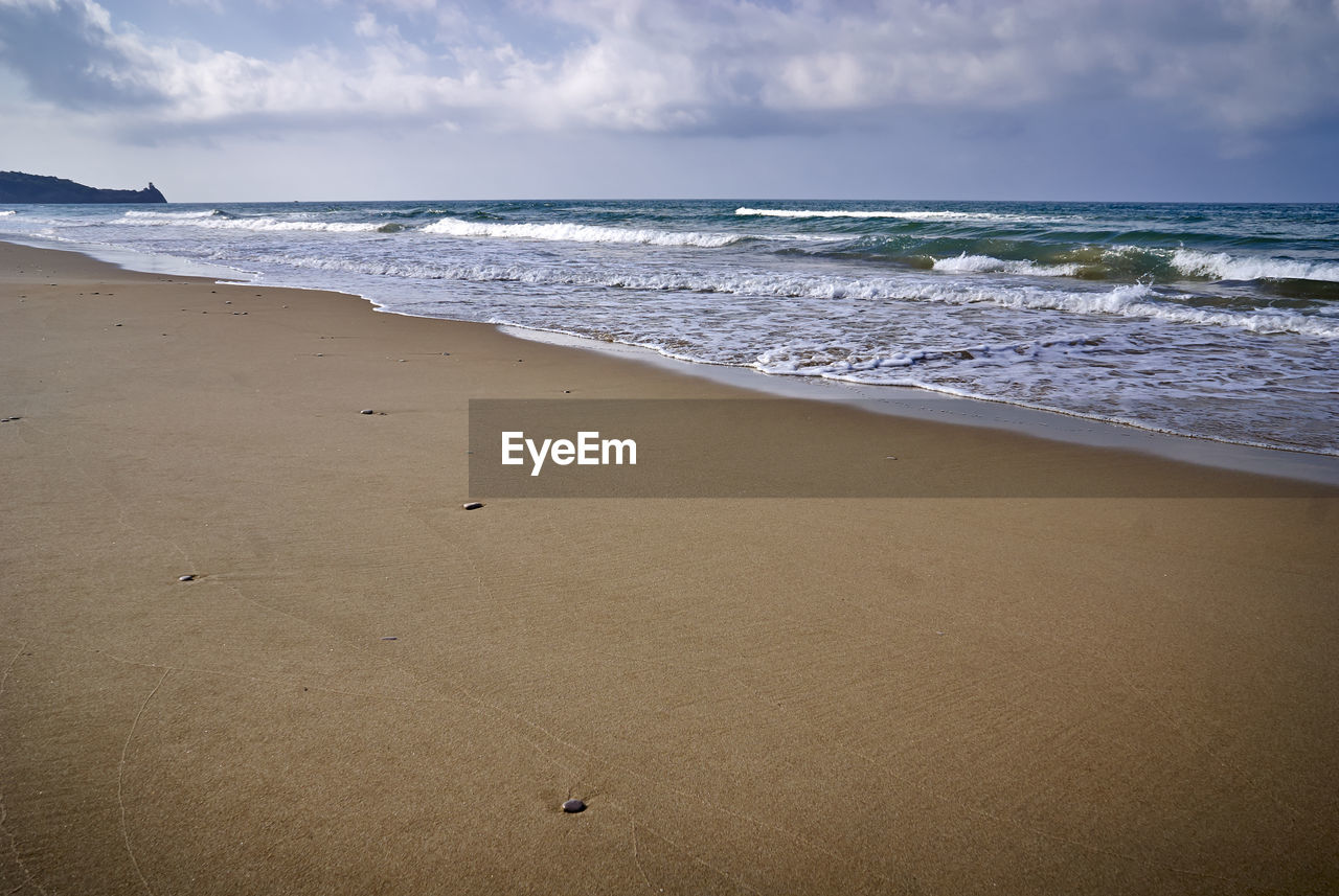 Scenic view of beach against sky