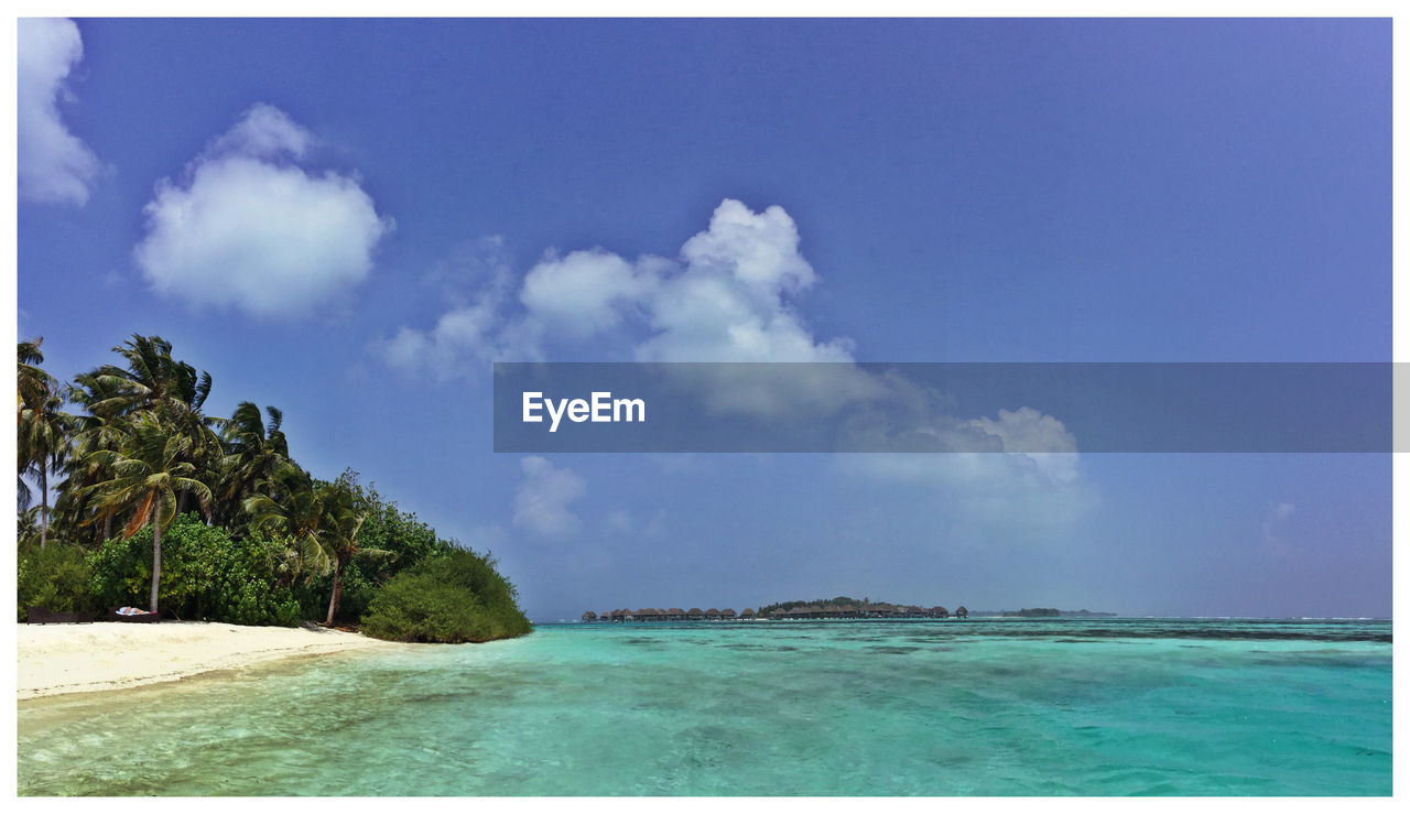 Scenic view of beach against sky