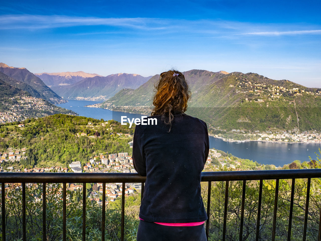 Woman admiring the landscape of lake como