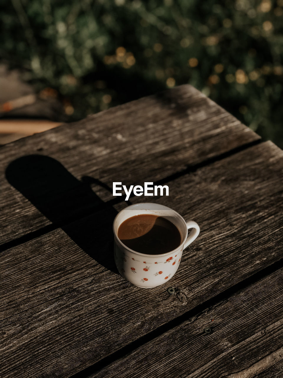 High angle view of coffee cup on table