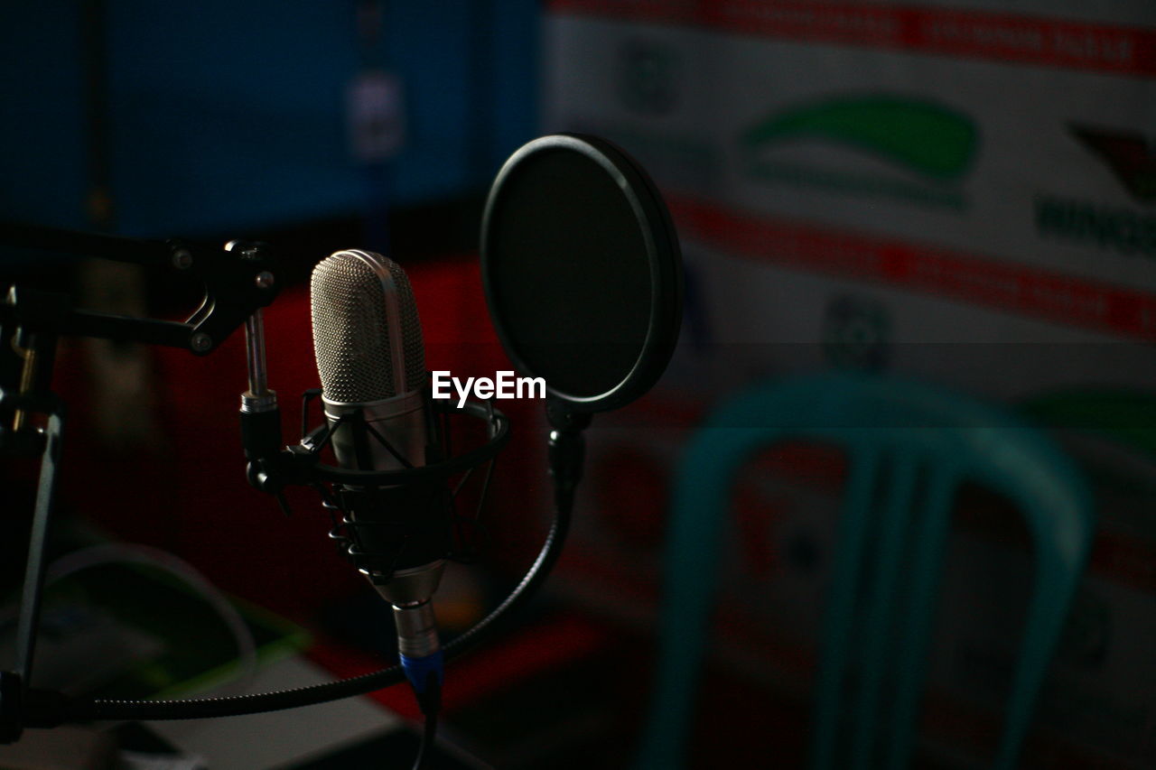 Close-up of microphone in studio