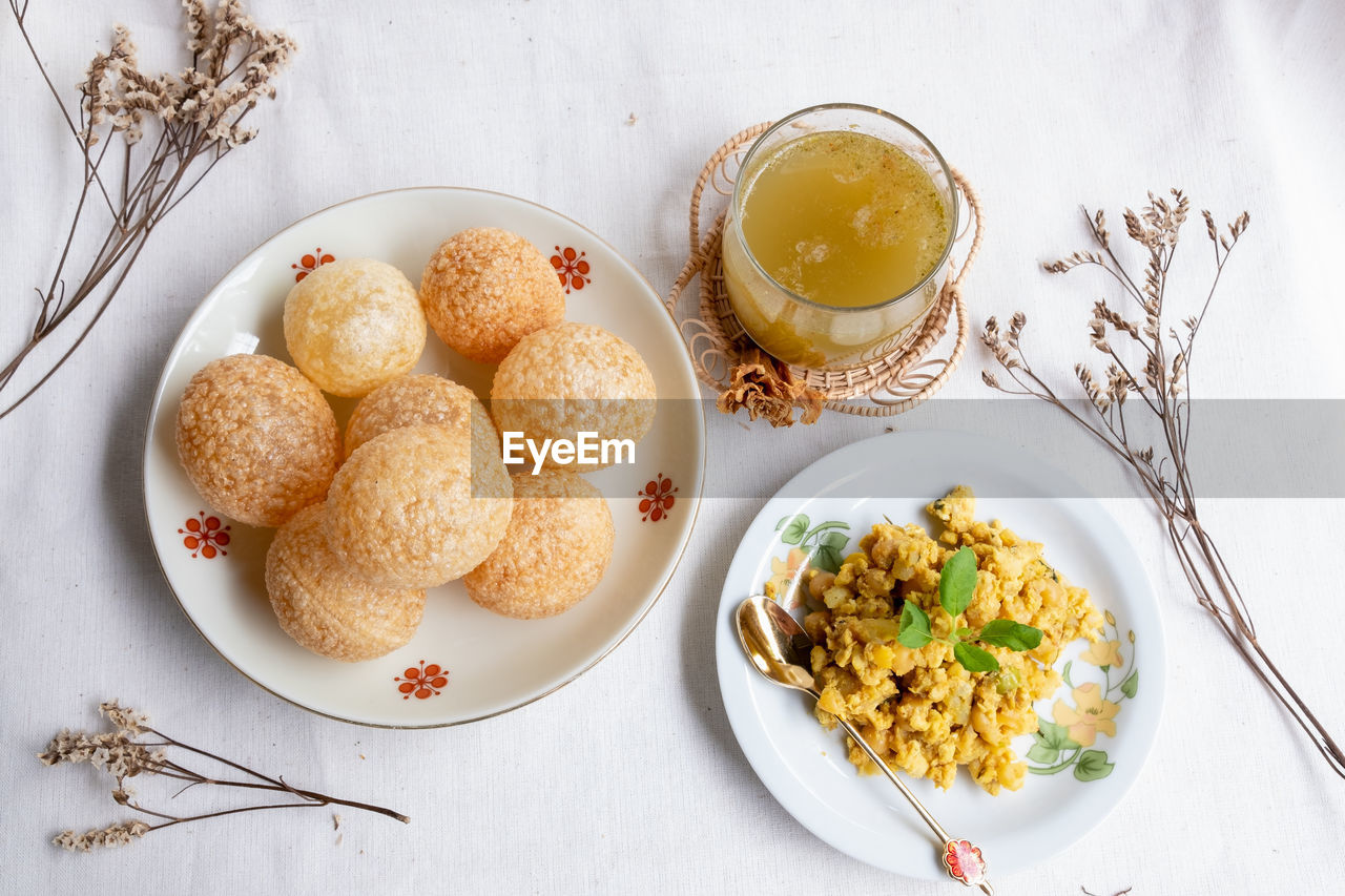 food and drink, food, dish, plate, healthy eating, freshness, eating utensil, produce, high angle view, kitchen utensil, breakfast, meal, no people, indoors, studio shot, cuisine, wellbeing, table, plant, bowl, still life, crockery, herb, drink, vegetable