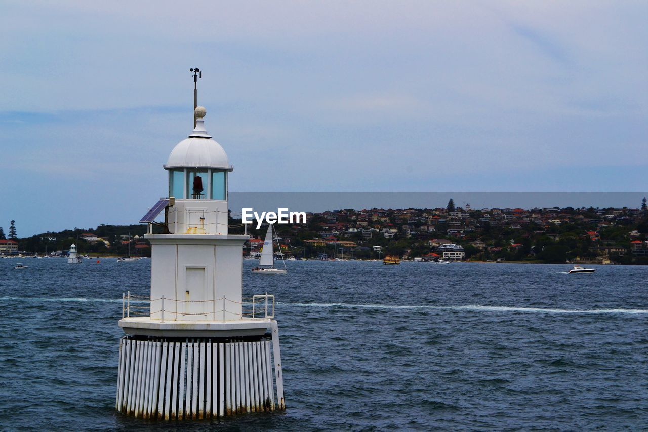 View of sea with buildings in background