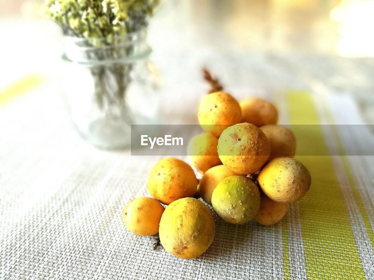 CLOSE-UP OF FRUIT ON TABLE