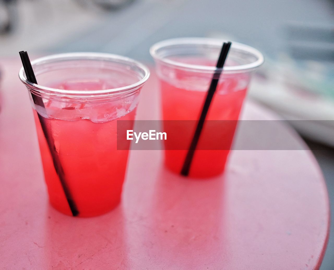 Close-up of red drinks in glasses on table