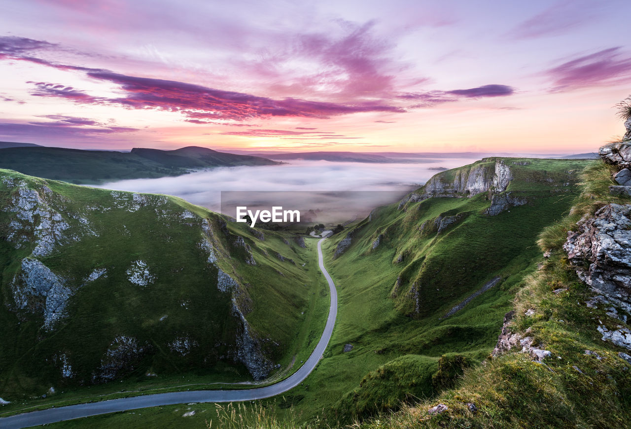 Scenic view of landscape against sky during sunset