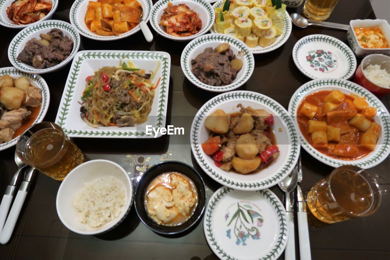 food and drink, food, variation, freshness, table, high angle view, plate, dish, healthy eating, still life, no people, indoors, asian food, meat, bowl, meal, cuisine, wellbeing, abundance, large group of objects, chinese food, directly above, fast food, serving size, lunch