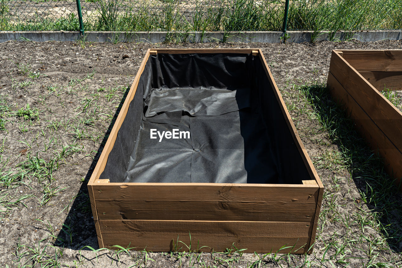 plant, nature, grass, day, no people, high angle view, wood, land, growth, outdoors, container, field, sunlight, backyard, box