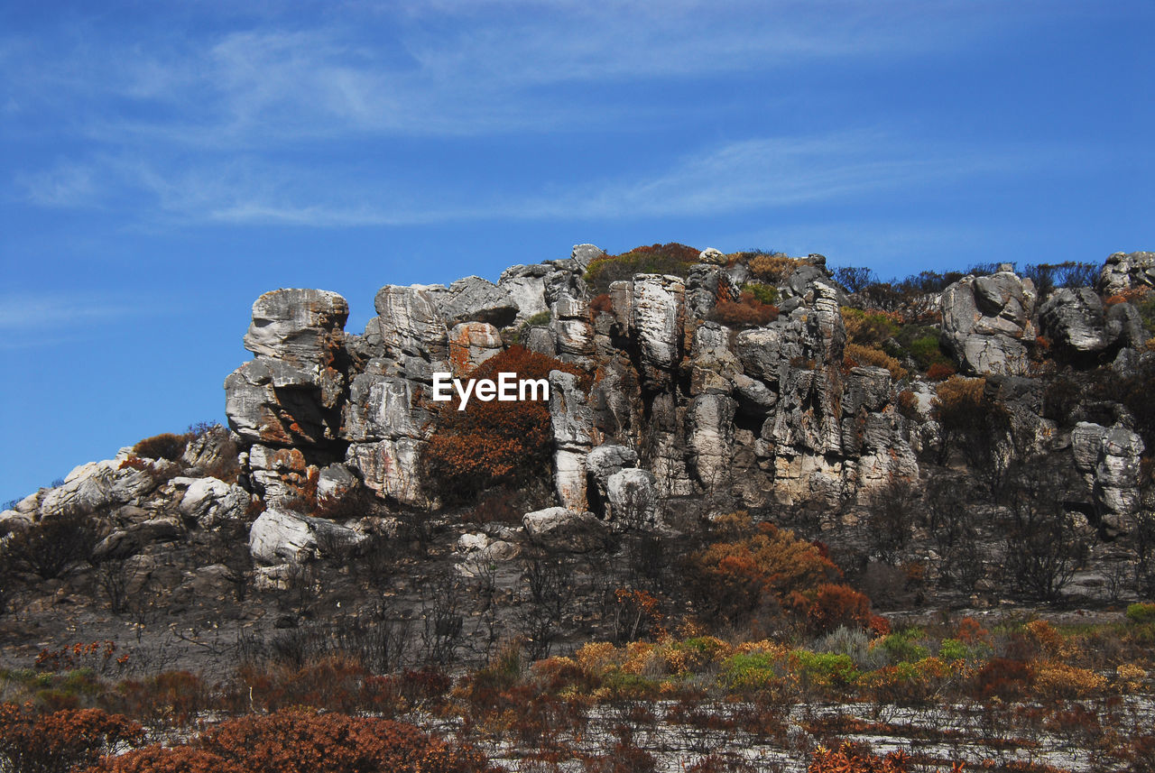 LOW ANGLE VIEW OF ROCK FORMATIONS